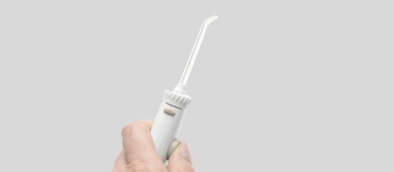 Comparatif visuel des jets dentaires Waterpik et Oral-B pour 2025